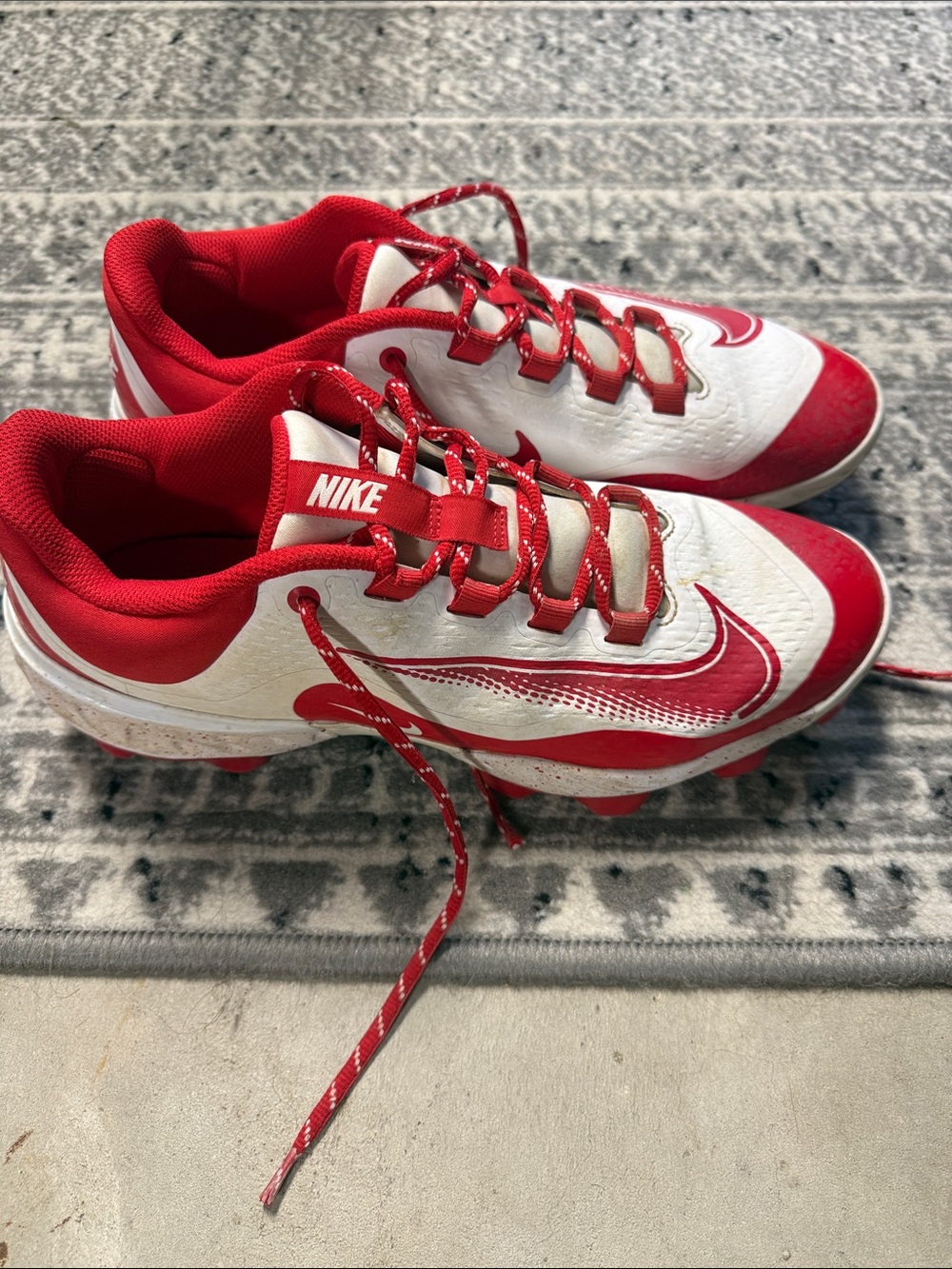 Nike mens Red and White Cleats with Bold Swoosh